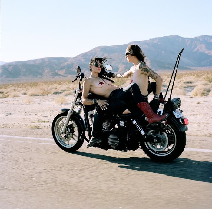 Girls on a motorcycle in Santiago de Cuba